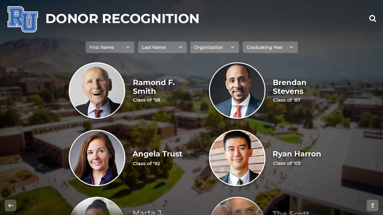 Alumni portraits displayed on campus showcasing graduate achievements Alumni recognition display